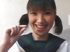 Pigtailed Japanese chick plays with her puss tube porn video