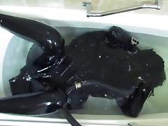 Rubber Girl In The Bath. tube porn video