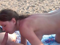 Sweetie is sucking on the beach tube porn video