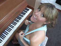 Sexy blonde Talia is playing on piano tube porn video