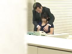 Office teen Megumi Haruka takes a pounding in a threesome tube porn video