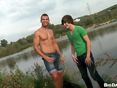 A twink and his well-built BF enjoy having sex by the pond tube porn video