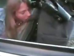 Darksome cop facefucks chained white wench in patrol car tube porn video