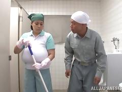 Mature Asian lets a guy play with her enormous boobs in a WC tube porn video
