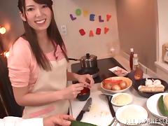 Smiley Japanese babe giving her man superb blowjob before having her pussy drilled with toy in the kitchen tube porn video